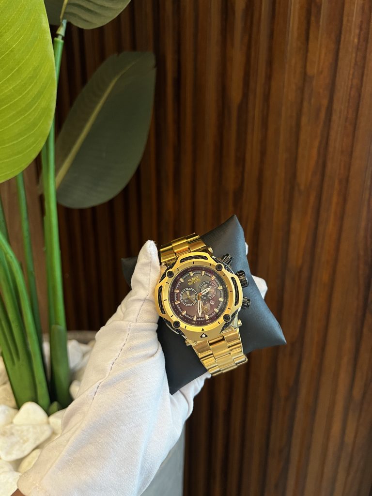 Relógio Catraca de Aço Dourado (Acompanha Brinde)